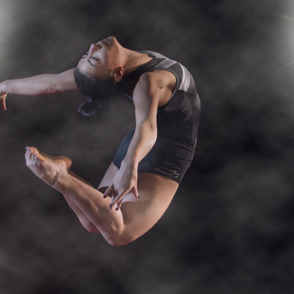 gymnast with smoke