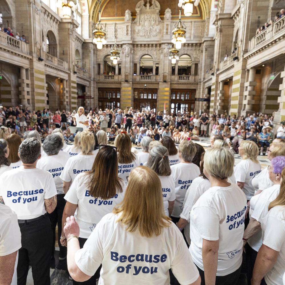 Choir in Kelvin Grove with Lottery branded t-shirts