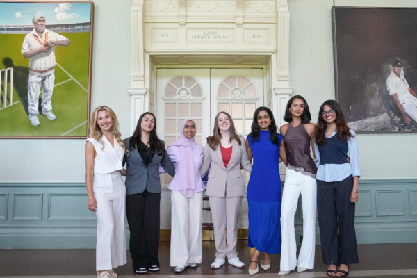 a group of women stand in the hall at Lords